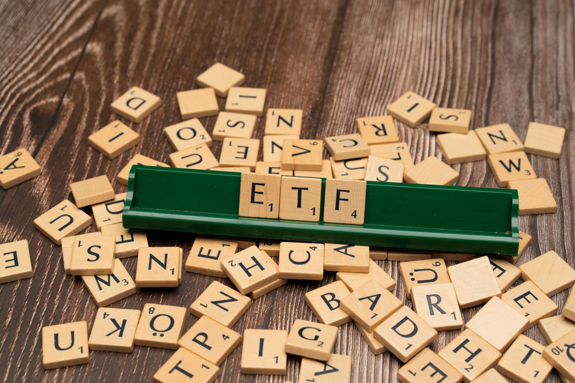 pexels-photo-18524062 the word etf on a wooden board with scrabble tiles
