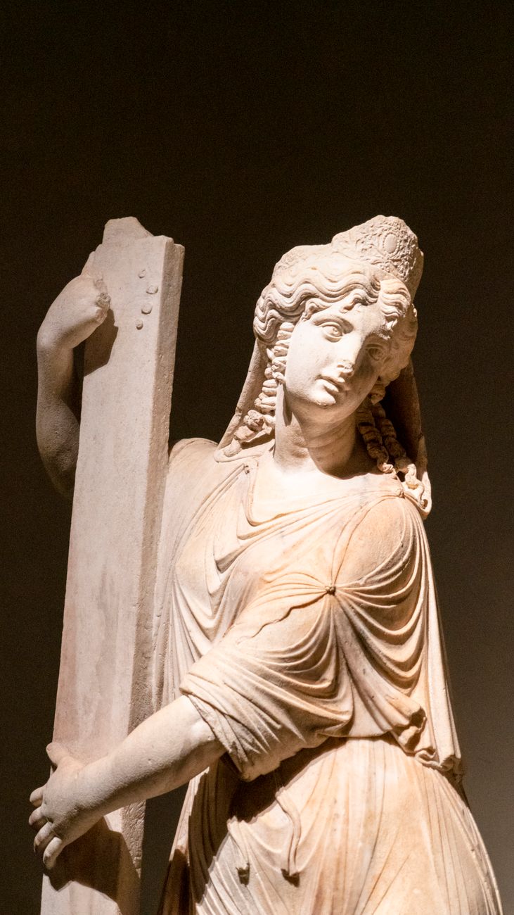pexels-photo-22937489 marble statue of a woman with a column