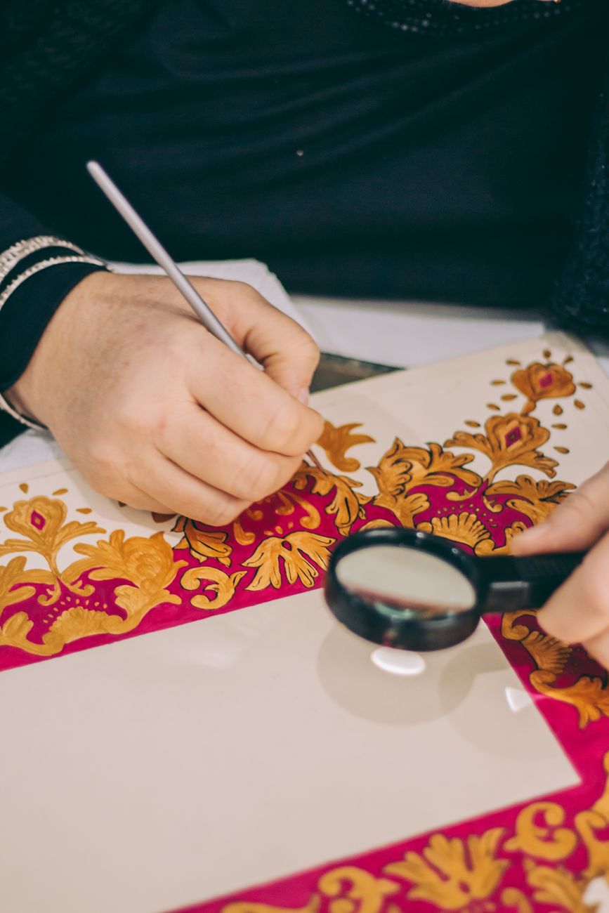 intricate craftsmanship painting on fabric design